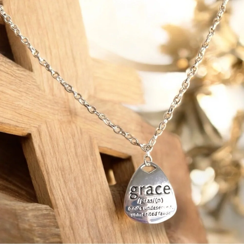 Grace Pendant Necklace in Silver toned and stainless steel. 18” long